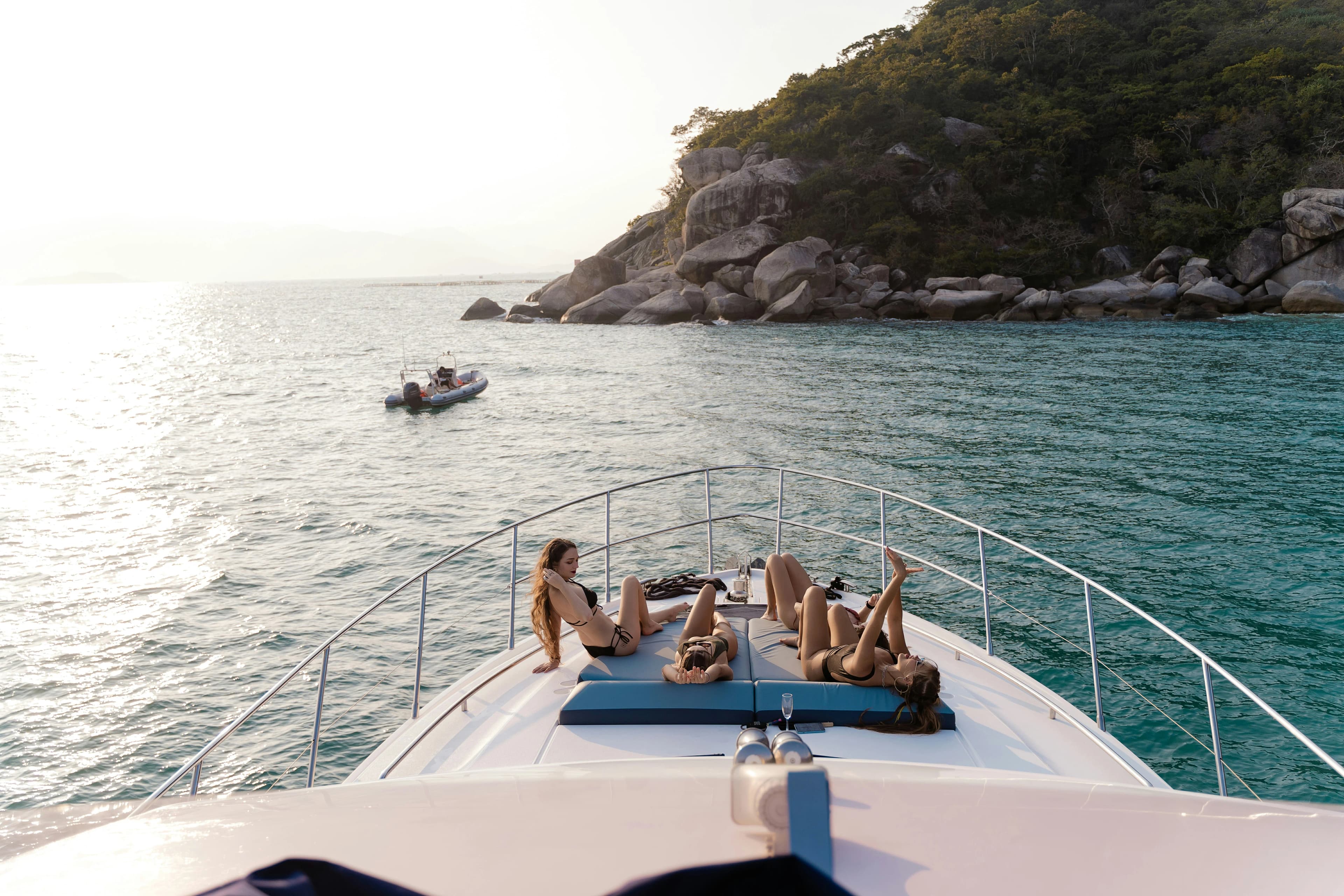 Yacht cruising at sunset on the Arabian Gulf